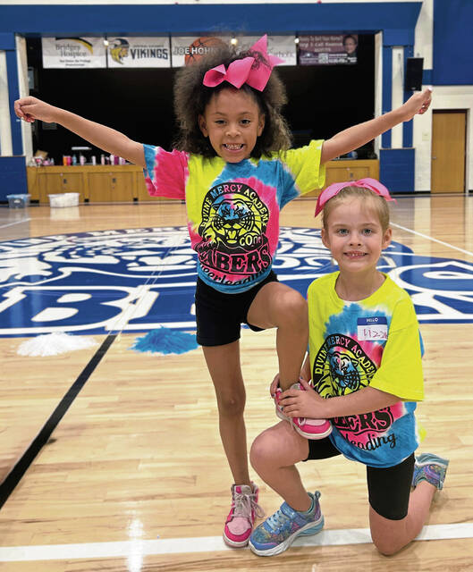 8640722_web1_dma-cheer-2