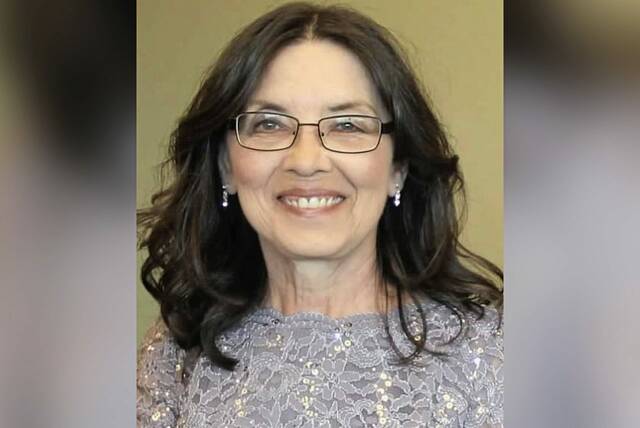 8654284_web1_PTR-TroyHillWoman-070325-001