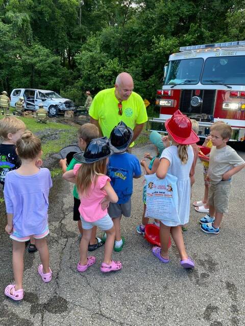 8689484_web1_chief-mcwilliams-and-kids