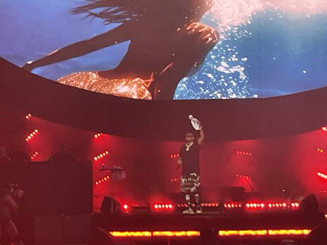 8698510_web1_ptr-wizkhalifareview2