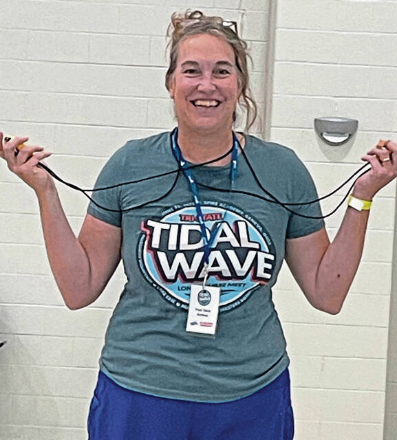 8707098_web1_her-swimmer-073125-3