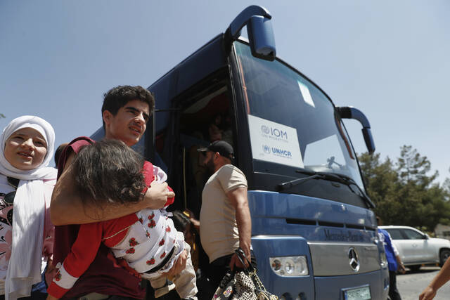 1st group of Syrian refugees returns home from Lebanon under new UN plan