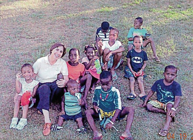 8710704_web1_sew-sisterlinda-haitichildren