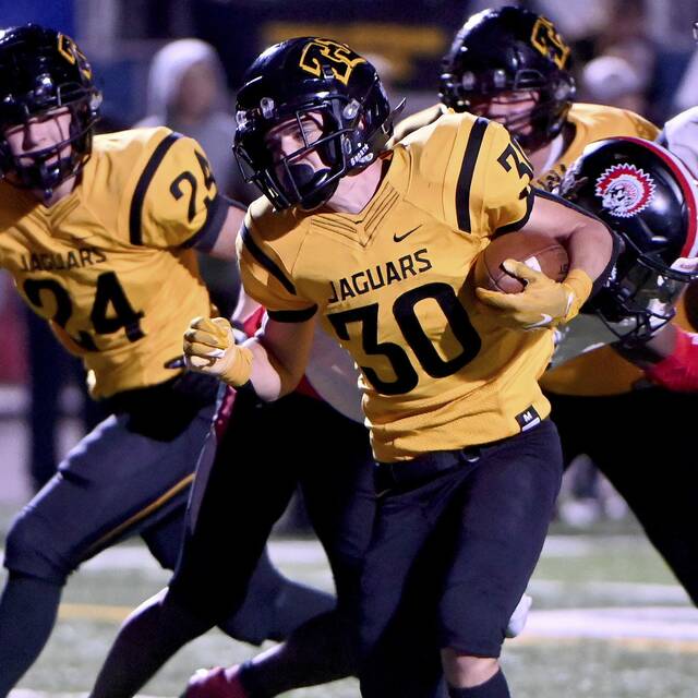 Behind standout running back, sturdy offensive line, Thomas Jefferson out to defend title