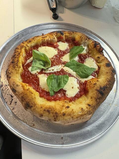 8741803_web1_her-pizzasurgeon-081425-6