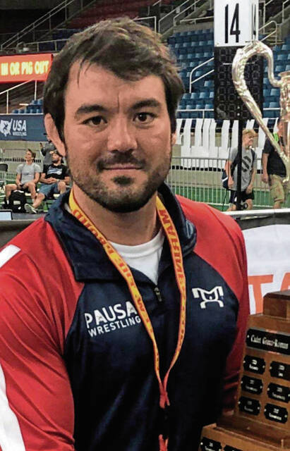 Norwin coach spends summer racking up air miles, helping wrestlers to new heights