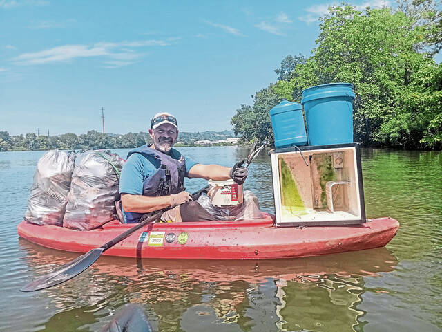 8793590_web1_vnd-rivertrashross-090725
