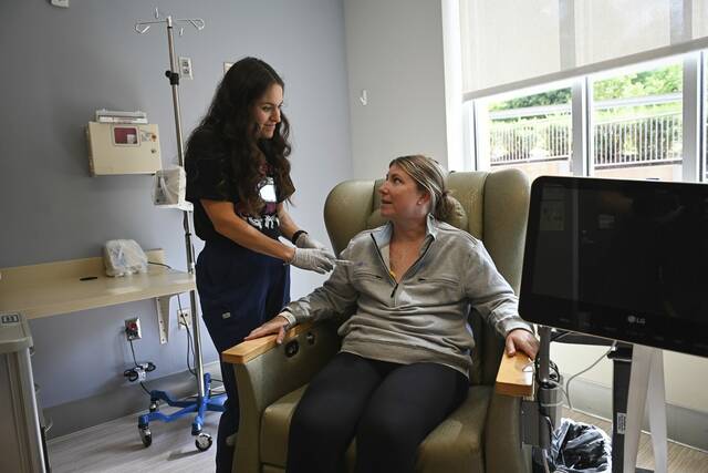 Told she had 2 years to live, Rostraver woman carries on fight 12 years later as mom, advocate