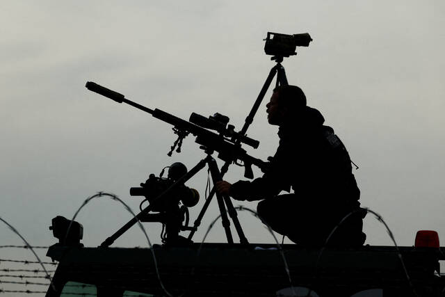 8810791_web1_2025-09-30T125028Z_82791131_RC2B2HA28EZZ_RTRMADP_3_USA-TRUMP-MILITARY