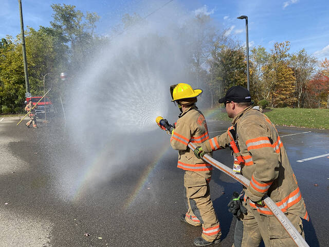 8830034_web1_naj-Firefighter4aDay1-091125