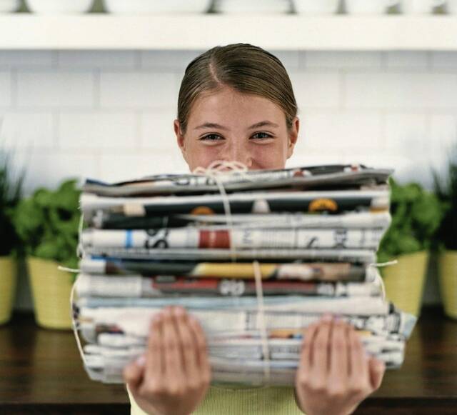 8895311_web1_Newspaper-recycling