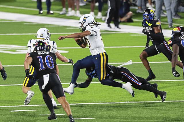 8899310_web1_gtr-WVUfootball02-092725