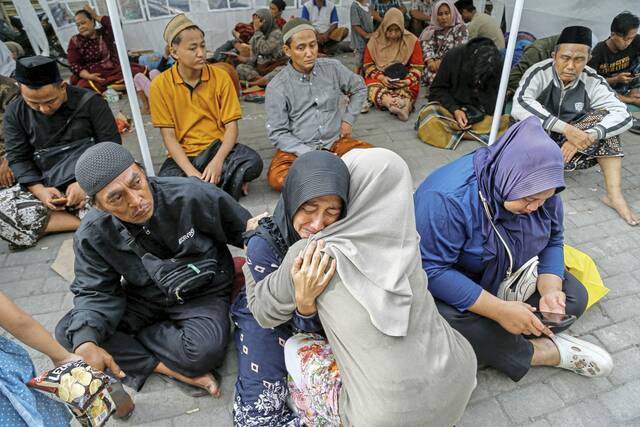 8910209_web1_2025-09-30T034517Z_434928063_RC202HA4PJM5_RTRMADP_3_INDONESIA-DISASTER