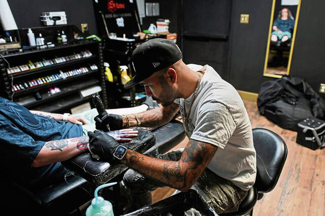 8855779_web1_gtr-FlashTattoos008-100425