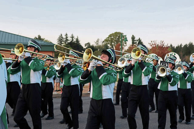8910831_web1_pcj-HCtrombones-102325