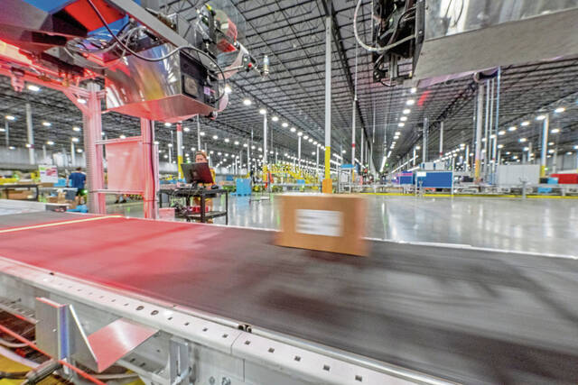 8911368_web1_gtr-WarehouseWorkers104-101525