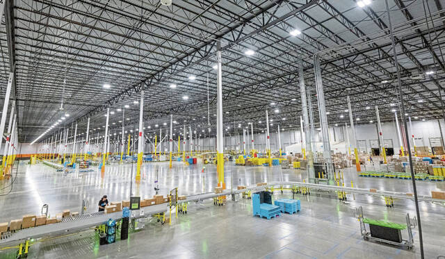 8911368_web1_gtr-WarehouseWorkers107-101525