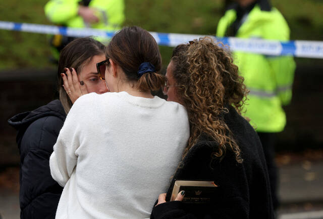 8913869_web1_2025-10-02T131600Z_65918388_RC2P3HA9WD66_RTRMADP_3_BRITAIN-POLICE-MANCHESTER