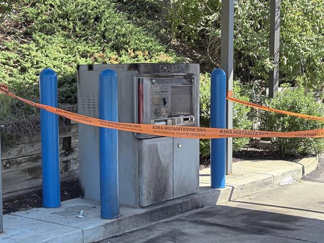 8914412_web1_nhj-rossatmfirebomb-100225