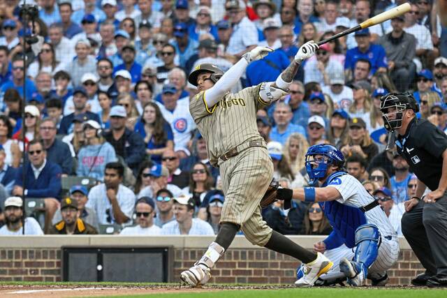8915981_web1_2025-10-01T214536Z_1429063073_MT1USATODAY27221222_RTRMADP_3_MLB-WILDCARD-SAN-DIEGO-PADRES-AT-CHICAGO-CUBS
