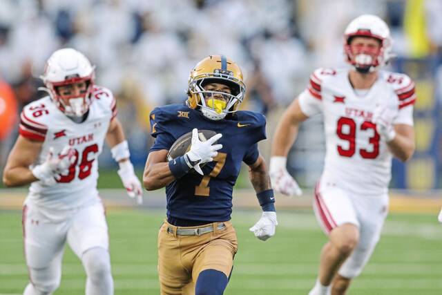8918528_web1_2025-09-27T233350Z_710398587_MT1USATODAY27188150_RTRMADP_3_NCAA-FOOTBALL-UTAH-AT-WEST-VIRGINIA