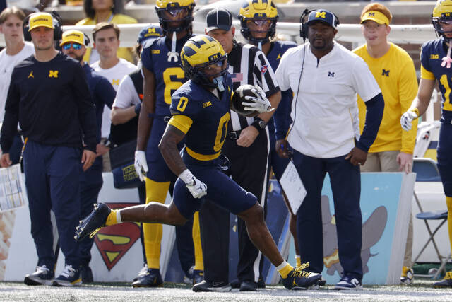 8929237_web1_2025-10-04T194512Z_1489785756_MT1USATODAY27245430_RTRMADP_3_NCAA-FOOTBALL-WISCONSIN-AT-MICHIGAN