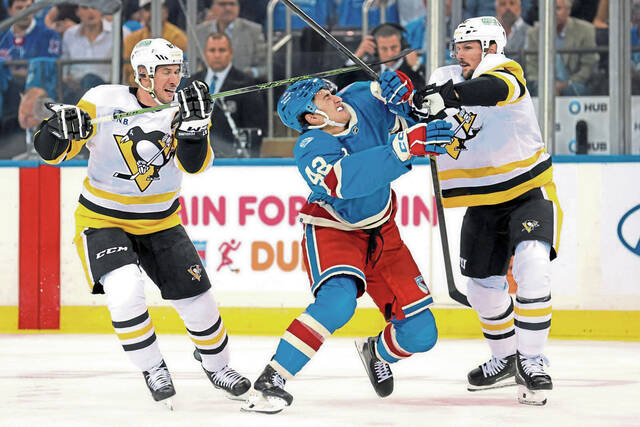 8931659_web1_2025-10-08T004437Z_1326438074_MT1USATODAY27269788_RTRMADP_3_NHL-PITTSBURGH-PENGUINS-AT-NEW-YORK-RANGERS