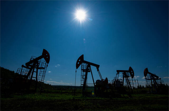 8942042_web1_oil-reuters