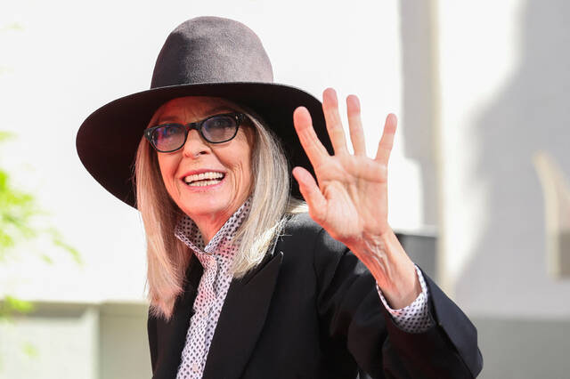8945490_web1_2025-10-11T190833Z_1_LYNXNPEL9A086_RTROPTP_4_PEOPLE-DIANE-KEATON-HANDPRINTS