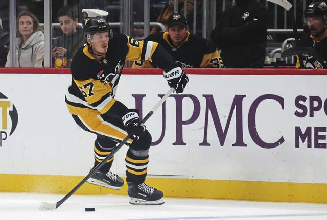 With growing family and optimism intact, Penguins' Rickard Rakell wants to stay put