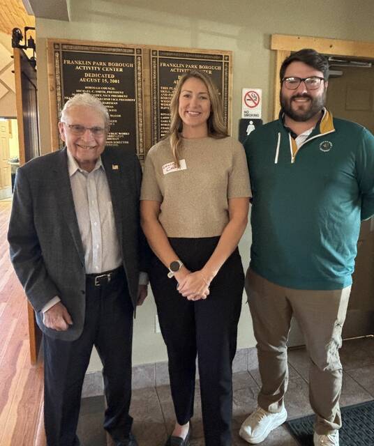 8957878_web1_naj-FPseniorlunchOfficials-103025