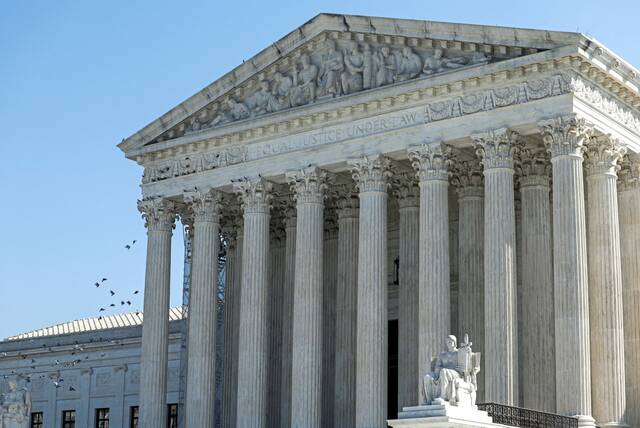 8968610_web1_2025-10-20T134217Z_2_LYNXMPEL9J0KK_RTROPTP_4_USA-COURT-GUNS
