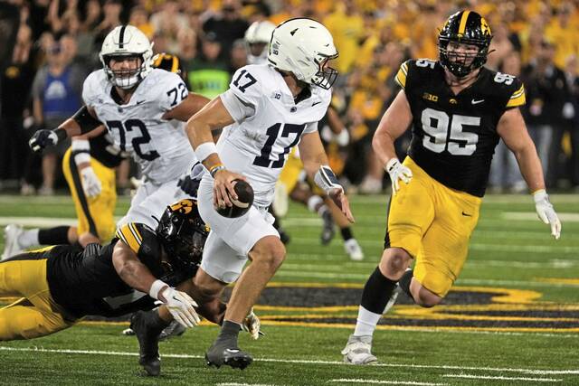 8970872_web1_2025-10-19T041839Z_1389428150_MT1USATODAY27367390_RTRMADP_3_PENN-STATE-NITTANY-LIONS-QUARTERBACK-ETHAN-GRUNKEMEYER-17