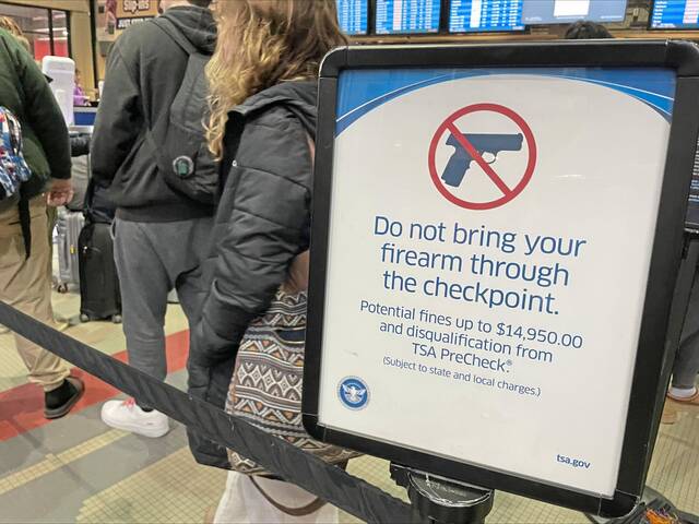 9001081_web1_PTR-TSA-Firearms-sign-Pittsburgh-International-Airport-2025