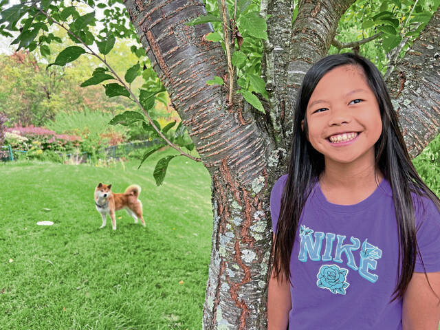 8984582_web1_her-neighbor-110625-3