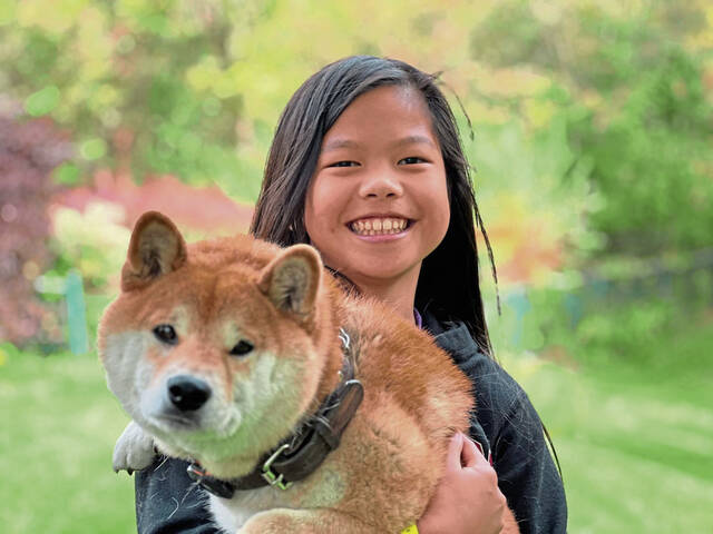 8984582_web1_her-neighbor-110625