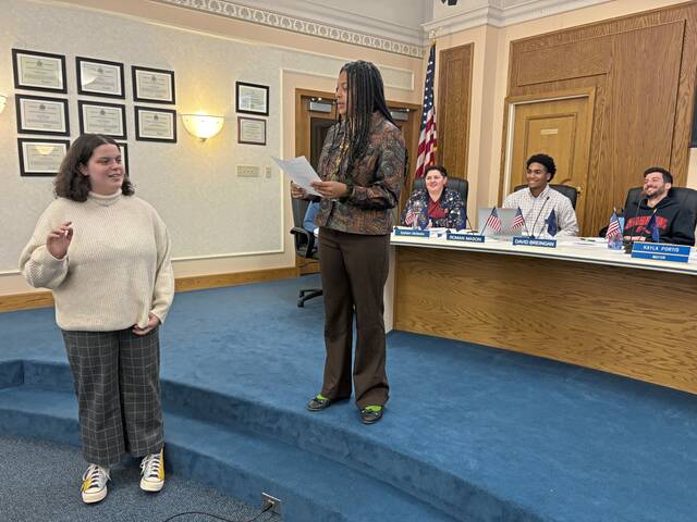 8985361_web1_HER-SharpJrCouncil-110625