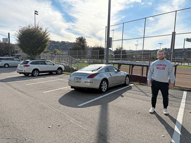 8997011_web1_HER-AspFieldParking-110625