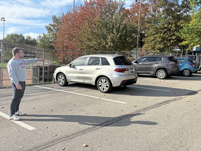 8997011_web1_HER-AspFieldParking2-110625