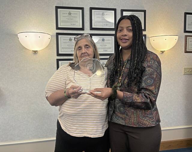 9005194_web1_HER-SharpHallofFame-110625