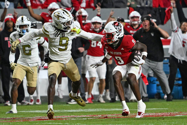 9011045_web1_2025-11-02T012914Z_1806266324_MT1USATODAY27480866_RTRMADP_3_NCAA-FOOTBALL-GEORGIA-TECH-AT-NORTH-CAROLINA-STATE