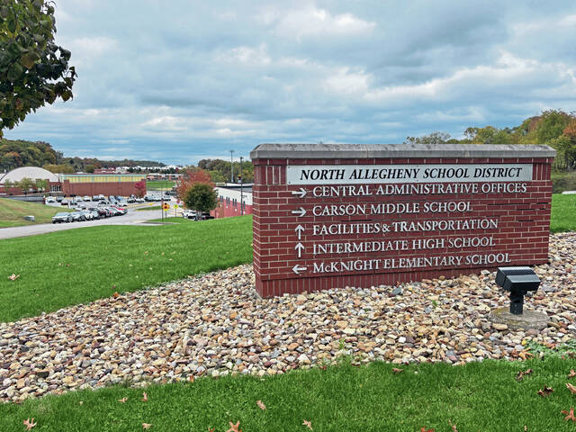 9012855_web1_naj-NASDsign-103025