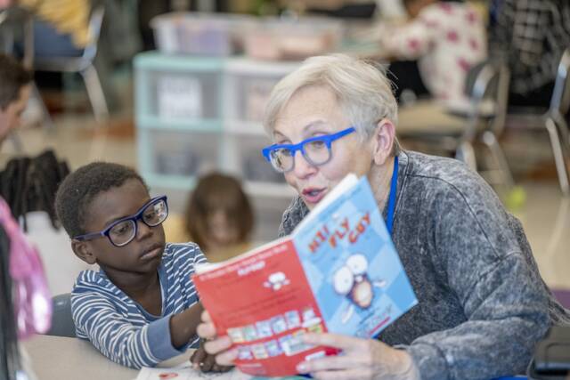 9013673_web1_her-reading102-111325