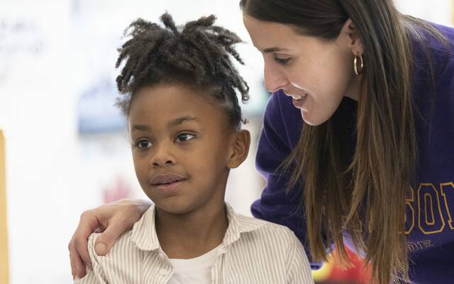 9013673_web1_her-reading106-111325