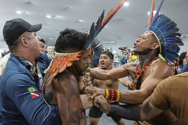 9015884_web1_2025-11-12T005811Z_377506968_RC2MUHAHJJSV_RTRMADP_3_CLIMATE-COP30-PROTEST