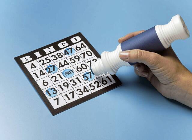 9016640_web1_Bingo-card-with-dauber