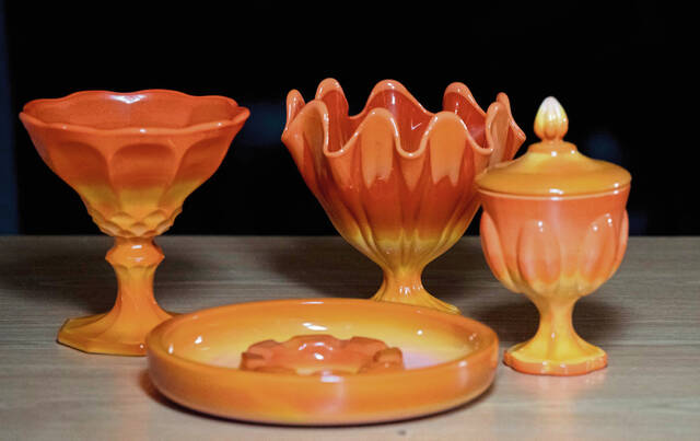 9017719_web1_gtr-SwungVases104-113025