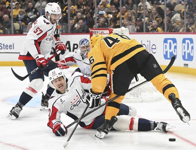 9025222_web1_ptr-PensCaps09-110725