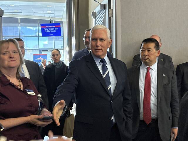 9025595_web1_PTR-penceVisit-110725