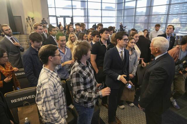 9025595_web1_PTR-penceVisit06-110725